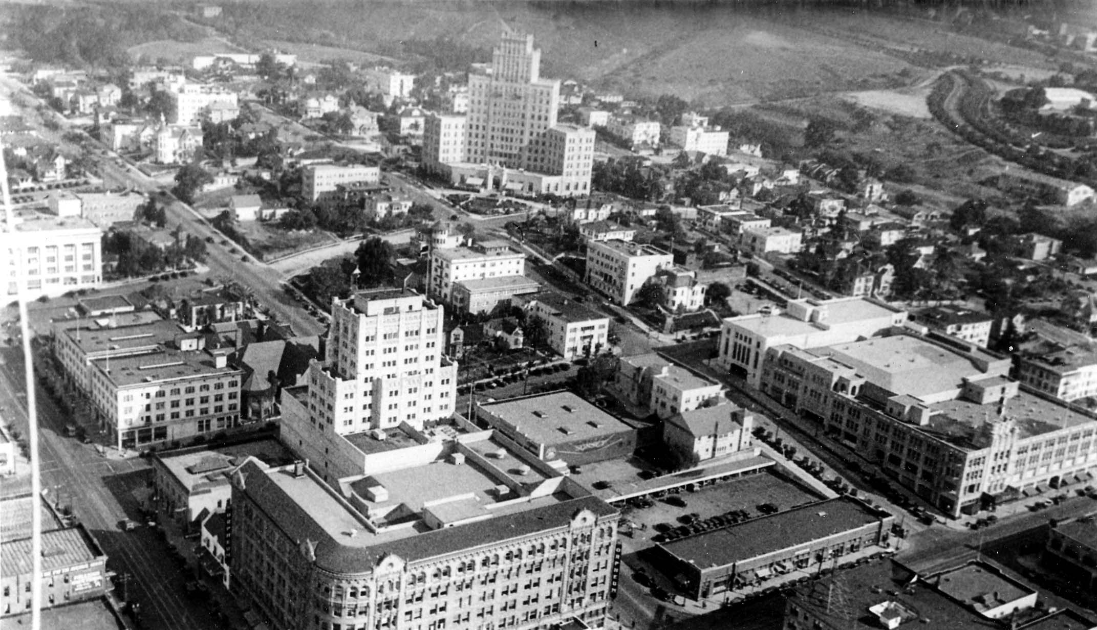 A closer aerial view of downtown San Diego, highlighting the El Cortez Hotel and surrounding 1920s urban architecture.