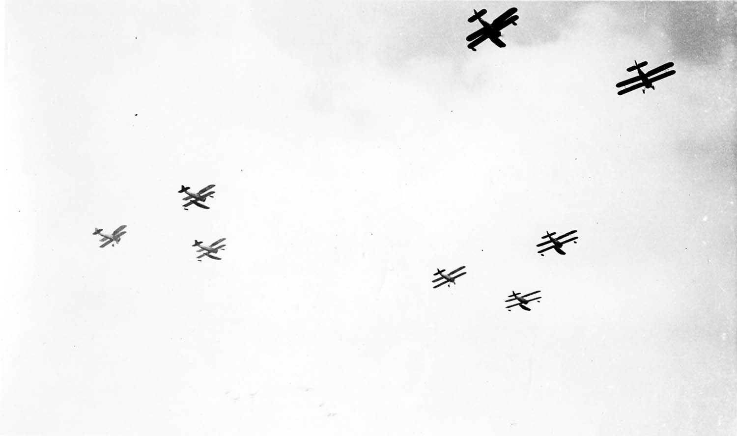 The final pass of the biplanes over the San Diego factory.
