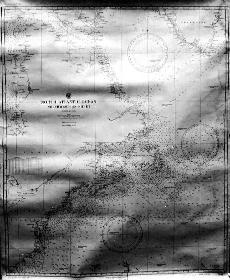 Large-format maritime navigation chart of the Northwestern North Atlantic Ocean showing coastal North America, Newfoundland, and flight routes.