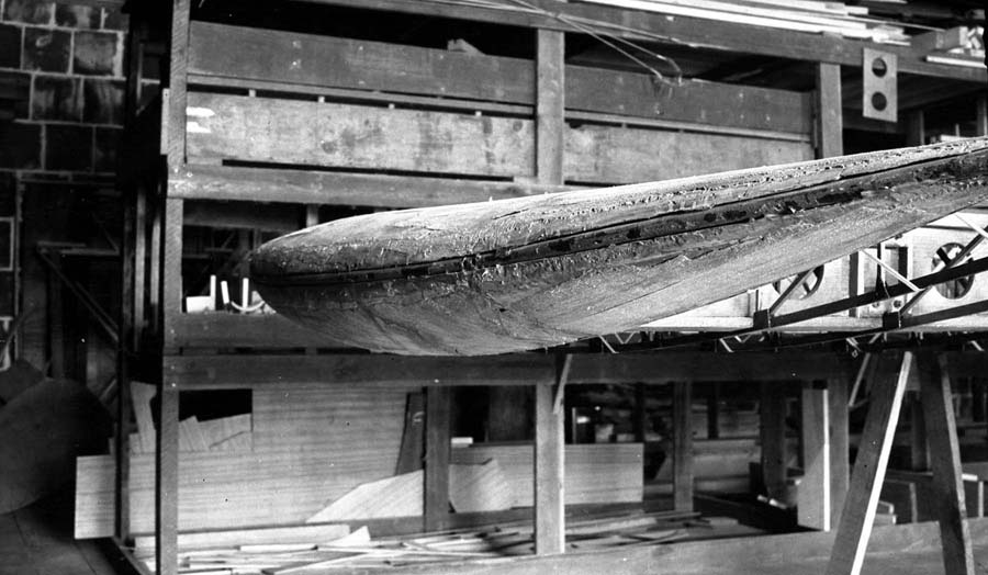 Detailed view of the curved wingtip framework on the Spirit of St. Louis.