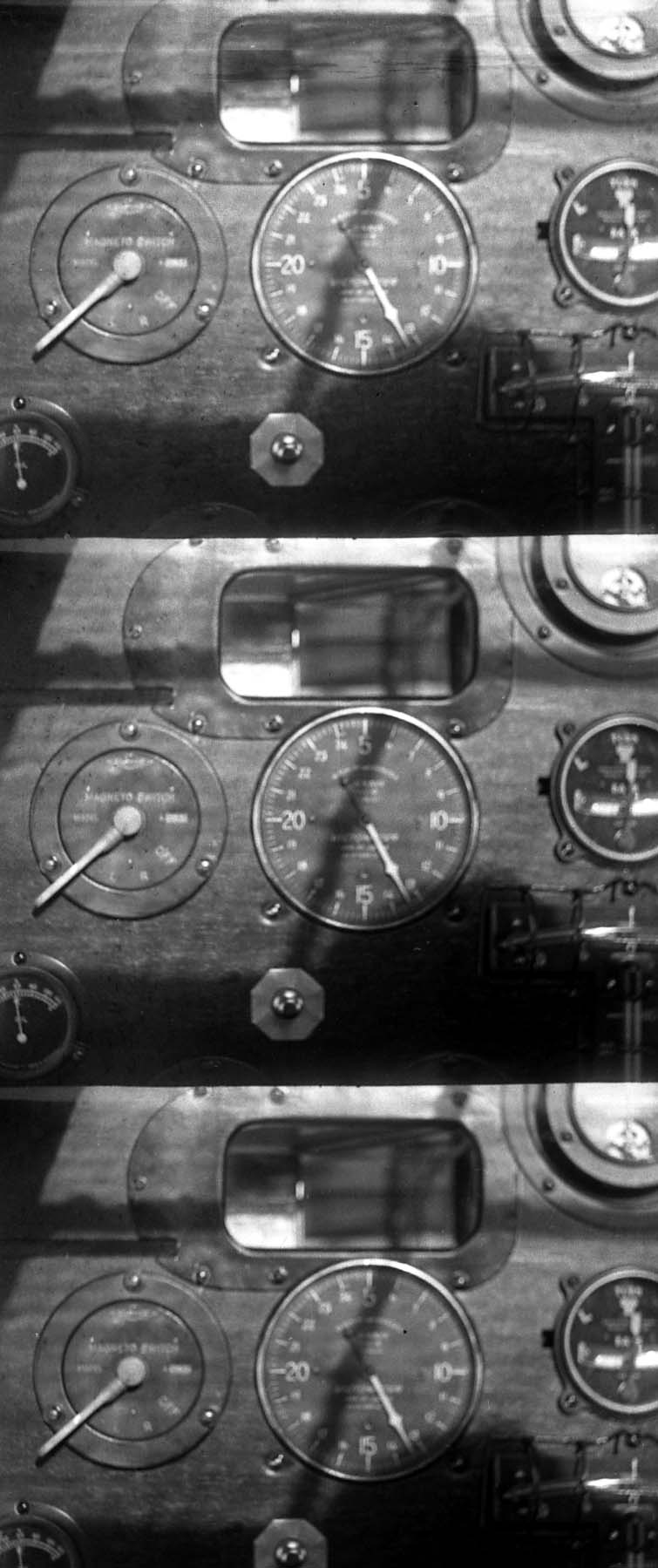 Three-frame vertical test strip recording the cockpit instrument panel and periscope mirror opening.