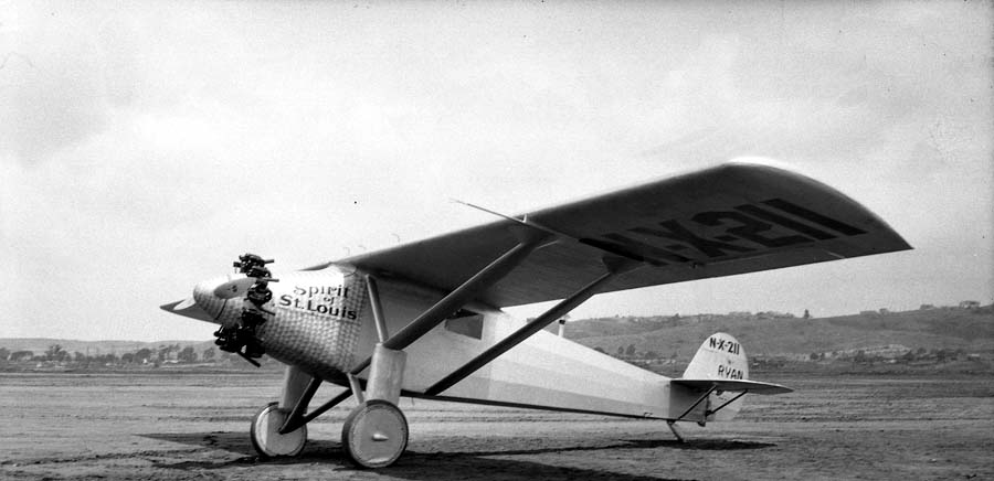 Angled low-perspective photograph showing the underside of the Spirit of St. Louis left wing and engine cowl.