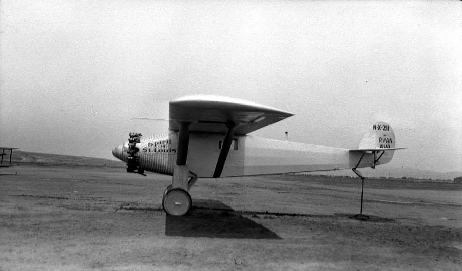 Left profile photograph of the Spirit of St. Louis on Dutch Flats with tail elevated on a testing trestle.