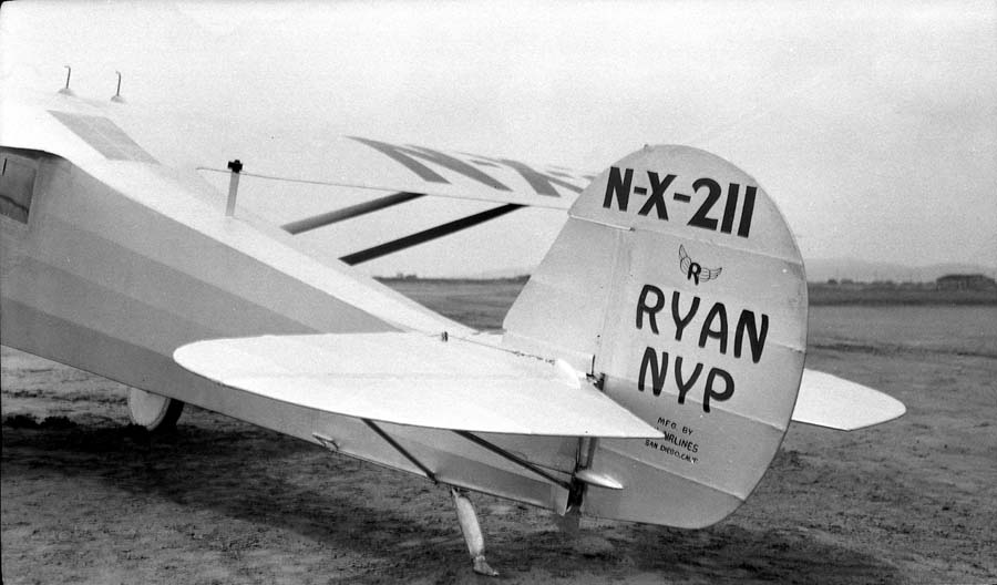 Broad perspective of the Spirit of St. Louis empennage showing rudder, elevators, and upper wing registration.