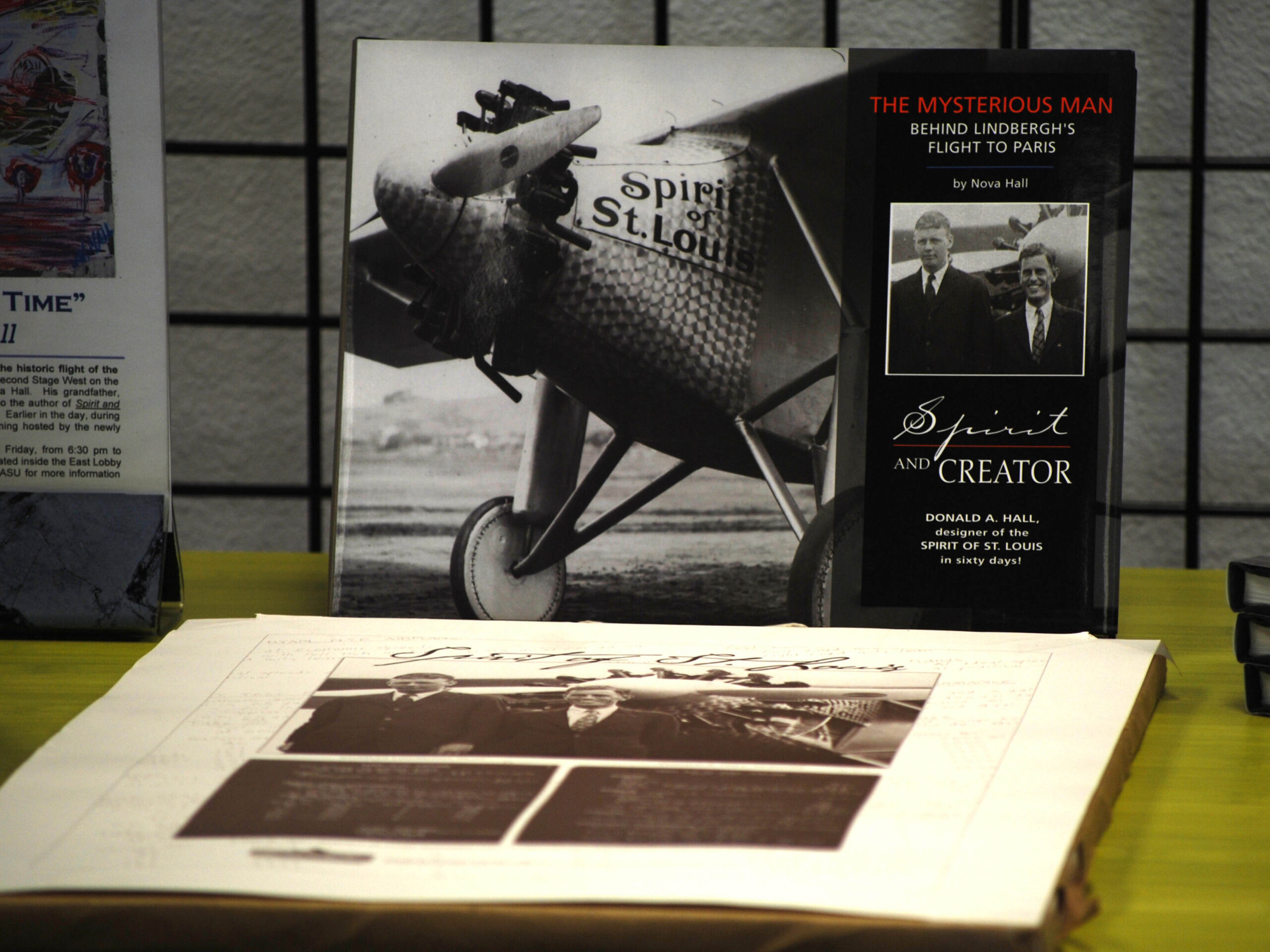 Spirit and Creator displayed with Flying Over Time exhibition materials